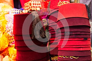 Turkish traditional red hat fez, fes or tarboosh with arabic  or Ottoman style