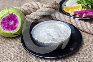 Turkish Traditional Tripe Soup on a linen background. Local name iskembe corbasi