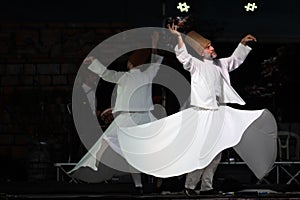 The Turkish whirling dancers or Sufi whirling dancers at Spirito Del Pianeta