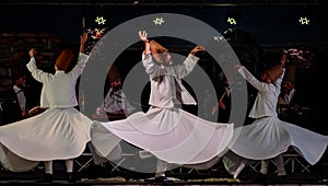 The Turkish whirling dancers or Sufi whirling dancers at Spirito Del Pianeta
