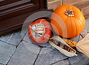 Turks Turban gourd with colourful ornamental corn and pumpkin