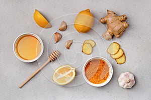 Turmeric, ginger, honey, garlic, lemon ingredients for making drinks