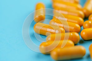 Turmeric herb yellow medicative capsules photo