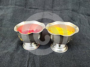 Turmeric and Kumkum Cup isolated on Black Background