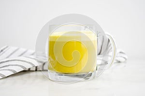 Turmeric Latte in a Glass Mug