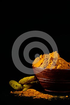 Turmeric powder and roots or barks