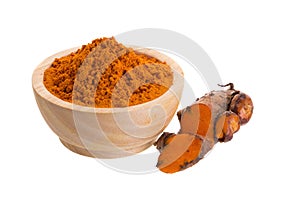 Turmeric powder and turmeric capsules on white background