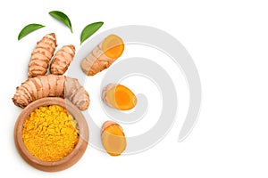 Turmeric powder in wooden bowl and turmeric root isolated on white background. Top view with copy space for your text