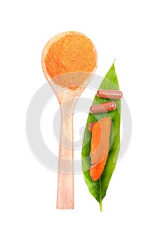 Turmeric Root Powder, Curcuma Root, Turmeric Capsule on Leaf; white background.Herb high vitamin C photo