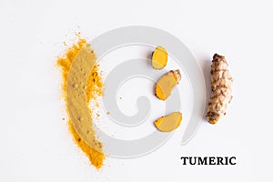 Turmeric root on white background photo