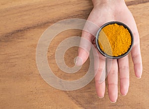 Turmeric spice on the table - space for text