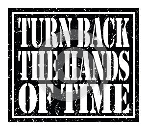 TURN BACK THE HANDS OF TIME, text written on black stamp sign