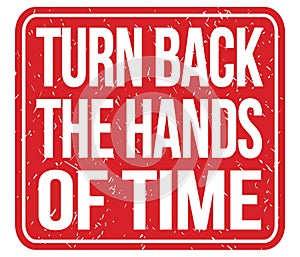 TURN BACK THE HANDS OF TIME, words on red stamp sign