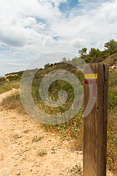 Turn left fingerpost in the Algarve, Portugal photo