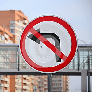 Turn left is prohibited. Traffic sign with crossed out arrow to