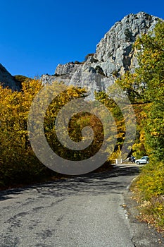 The turn of the mountain narrow road is covered with asphalt