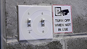 Turn off light switch by saving power concept photo