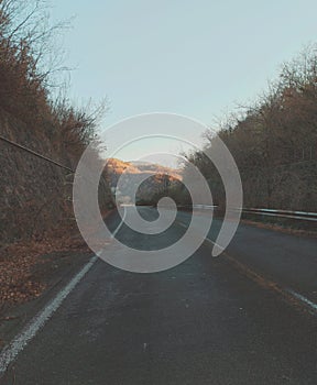 The turn of the road and the mountain at the end to Appennino