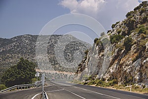 Turn of rural mountain highway in Turkey. Dangerous road in the mountains of Turkey. Traffic safety concept