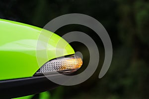 Turn signal or blinker in mirror of a modern car