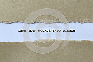 turn your wounds into wisdom on white paper