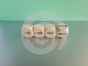 Turned a cube and changes words 'the same old thinking' to 'the same old results
