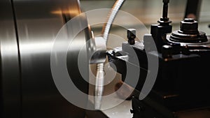 Turning bench lathe machine working - closeup, slow motion