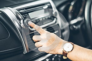 Turning on car air conditioning system