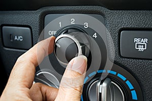 Turning on car air conditioning system