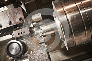 Turning cnc machine at metal work industry. Multitool precision manufacturing and machining
