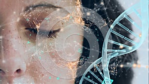 Turning DNA strand with face in the background