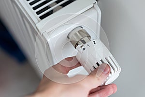 turning down thermostat on radiator to save energy due to heating cost price hike