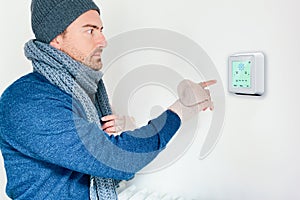 Turning on home heating system using digital thermostat