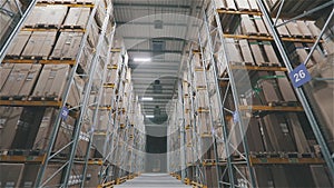 Turning on the light in the warehouse. Turning on lighting in a large warehouse, turning on lighting in an industrial