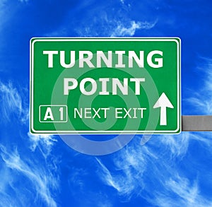 TURNING POINT road sign against clear blue sky
