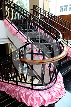 The turning staircase with iron railings
