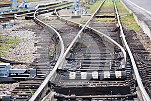 Turnouts on the railway. Rails, sleepers and rubble on the railway track