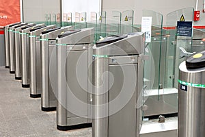 Turnstiles for checking tickets and passing passengers, access control system