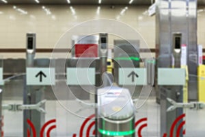 Turnstiles in the metro with cameras with face recognition system. Total control of the population. Front view. Blurred