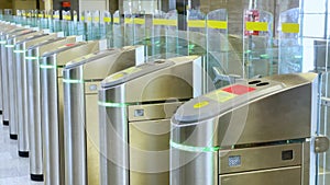 Turnstiles for presenting and scanning tickets on the platform of public railway transport