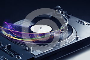 Turntable playing vinyl with glowing abstract lines