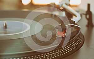 Turntable is playing vinyl LP record
