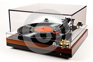 turntable with spinning vinyl record, stylus and dust cover