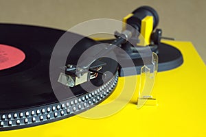 Turntable with vinyl record closeup