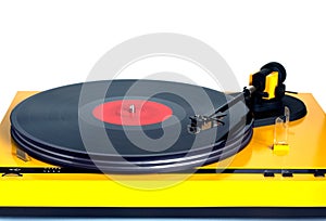 Turntable in yellow case front view isolated