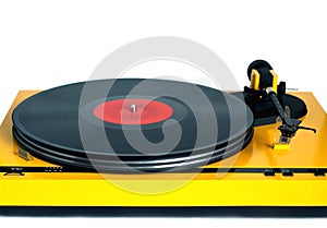 Turntable in yellow case front view isolated