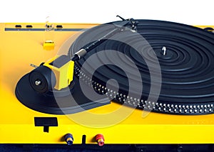 Turntable in yellow case rear view isolated