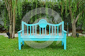 Turqouise color garden bench photo