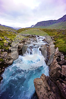 Turqouise waterfall Iceland photo