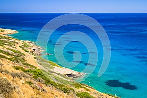 Turquise water of Mirabello bay at the coastline of Crete, Greece